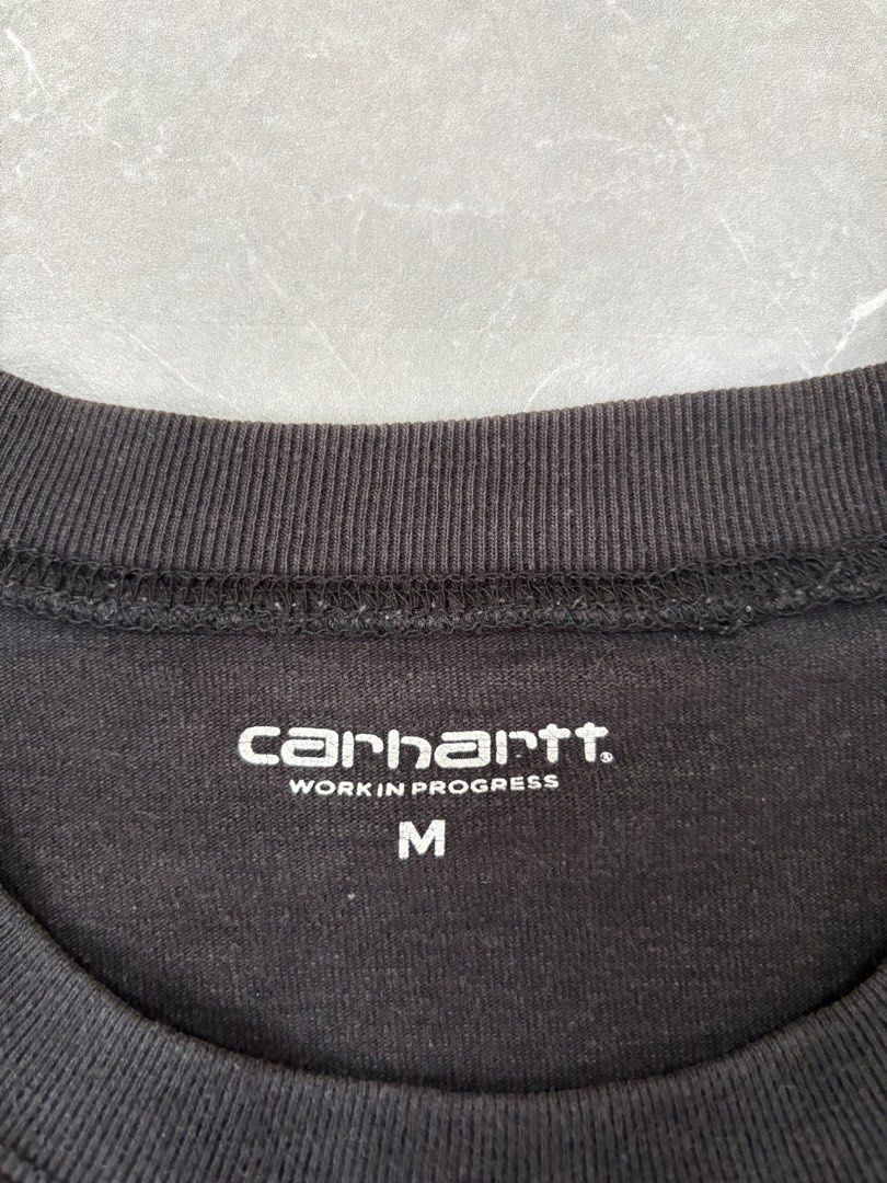 Carhartt WIP Black T-Shirt Medium (Category: Tshirts & Polo Shirts ) located in General Trias. Submitted by charleslrnz (Listing ID 1467211109, Image 2). Description: - Brand/Model: Carhartt Work In Progress (WIP) Tee - Color: Classic Black - Size: Medium (fits true to size) - Details: Crew neckline, short sleeves, embroidered chest logo patch - Material: Comfortable cotton blend - Origin: Made in Cambodia - Style: Versatile everyday streetwear e
