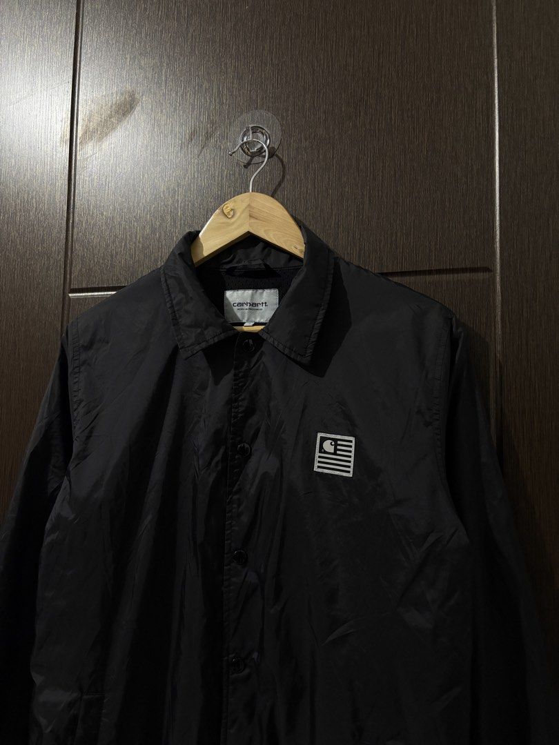 CARHARTT WIP STATE FLAG COACH JACKET (Category: Coats, Jackets and Outerwear) located in Naga. Submitted by sislovesme (Listing ID 1467299599, Image 3). Description: •9.5/10 CONDITION •NO FLAWS •SIZE SMALL ON TAG •WIDTH 21 INCHES •LENGHT 27 INCHES.