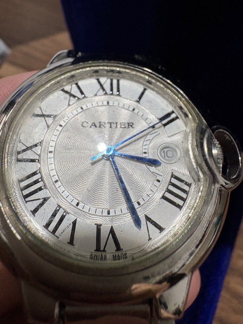 Cartier Ballon Bleu Watch (Category: Luxury Watches) located in Bacoor. Submitted by grandfire.02c841 (Listing ID 1467245313, Image 2). Description: - Brand: Cartier - Model: Ballon Bleu Automatic - Material: Stainless steel case and metal link bracelet - Dial: Silver guilloche with Roman numerals, blued steel hands, and date window at 3 o'clock - Condition: Good working condition, keeps time well, normal wear scratches from daily use - Inclusion