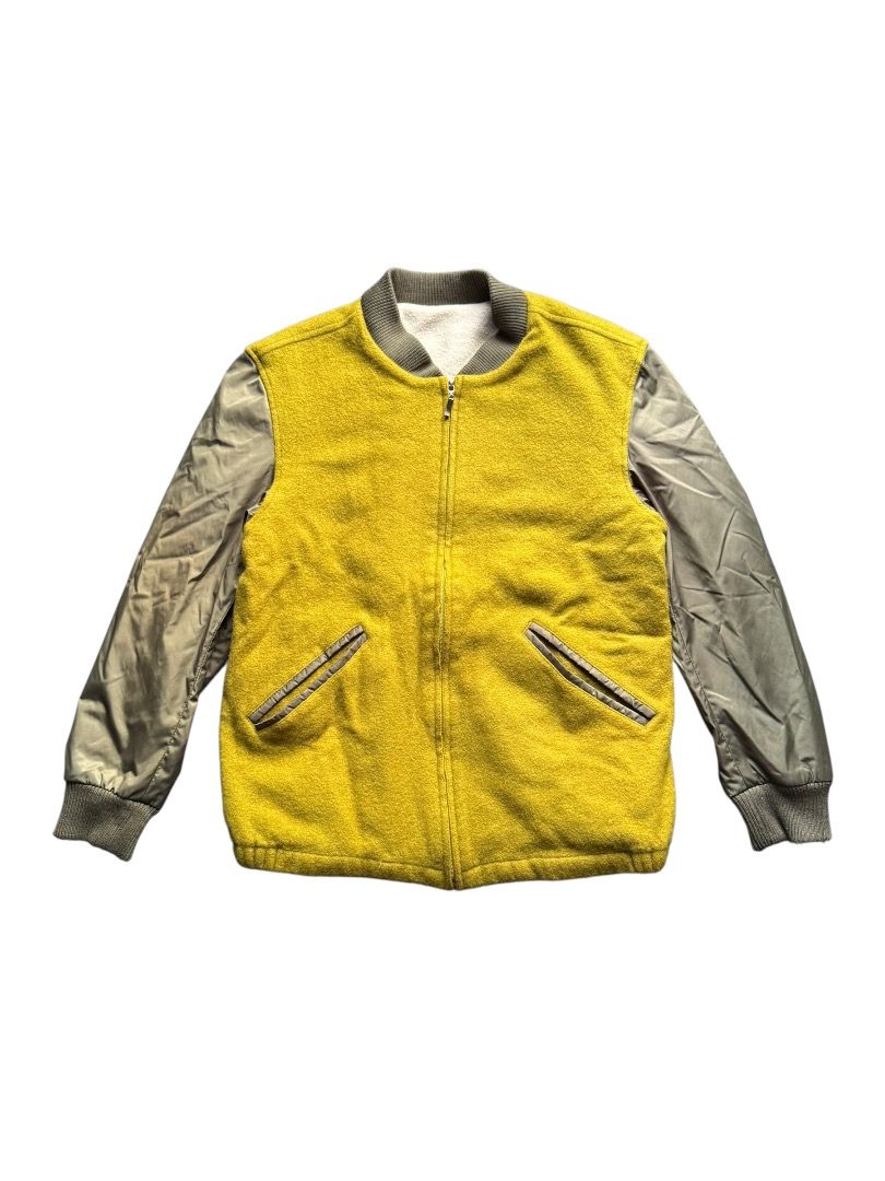 Casero Republic Yellow Bomber Jacket (Category: Coats, Jackets and Outerwear) located in Pasig City. Submitted by hoardwrld (Listing ID 1467178554, Image 1). Description: Width: 20 Length: 25 - Brand: Casero Republic - Style: Bomber jacket with zip-up front and two slanted pockets - Color: Mustard yellow textured front with greyish-olive sleeves - Comfort: Warm fleece lining with ribbed collar, cuffs, and hem - Size: Tagged Size 46 - Condition: C