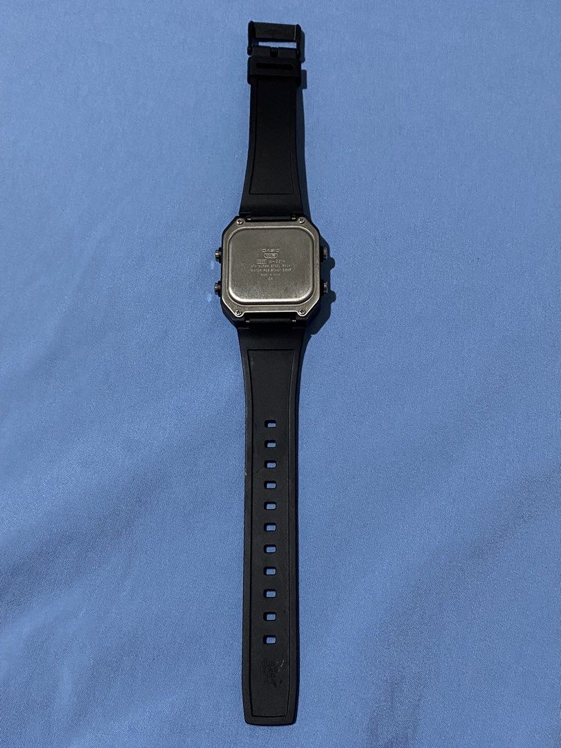 Casio W-221H Digital Watch (Category: Women's Watches) located in Manila. Submitted by dynali0504 (Listing ID 1467297993, Image 2). Description: - Brand: Casio W-221H Digital Watch - Color: Black resin strap with square grey bezel - Battery: 10-year battery life for hassle-free wear - Water Resistance: 5-bar water resistant - Features: 4 side push buttons, backlight, and stainless steel backplate - Condition: 100% working, lightweight, and durabl