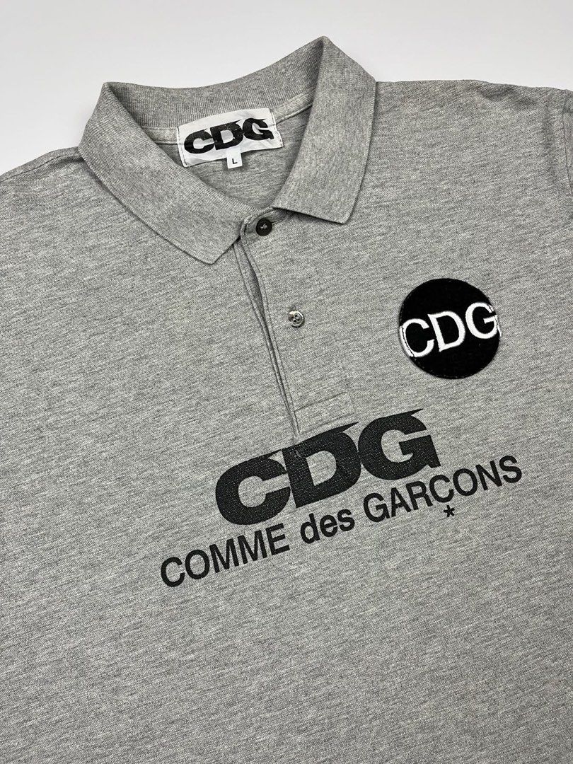 CDG Comme des Garçons - Script S/S Polo Shirt (Category: Tshirts & Polo Shirts ) located in Puerto Princesa. Submitted by rrugsgallery (Listing ID 1467330594, Image 3). Description: CDG Comme des Garçons - Script S/S Polo Shirt Tagged Size: Large Length: 26.5 Width: 21 Condition: Very good Color rate: 9.5 Flaws: Minor sign of usage .