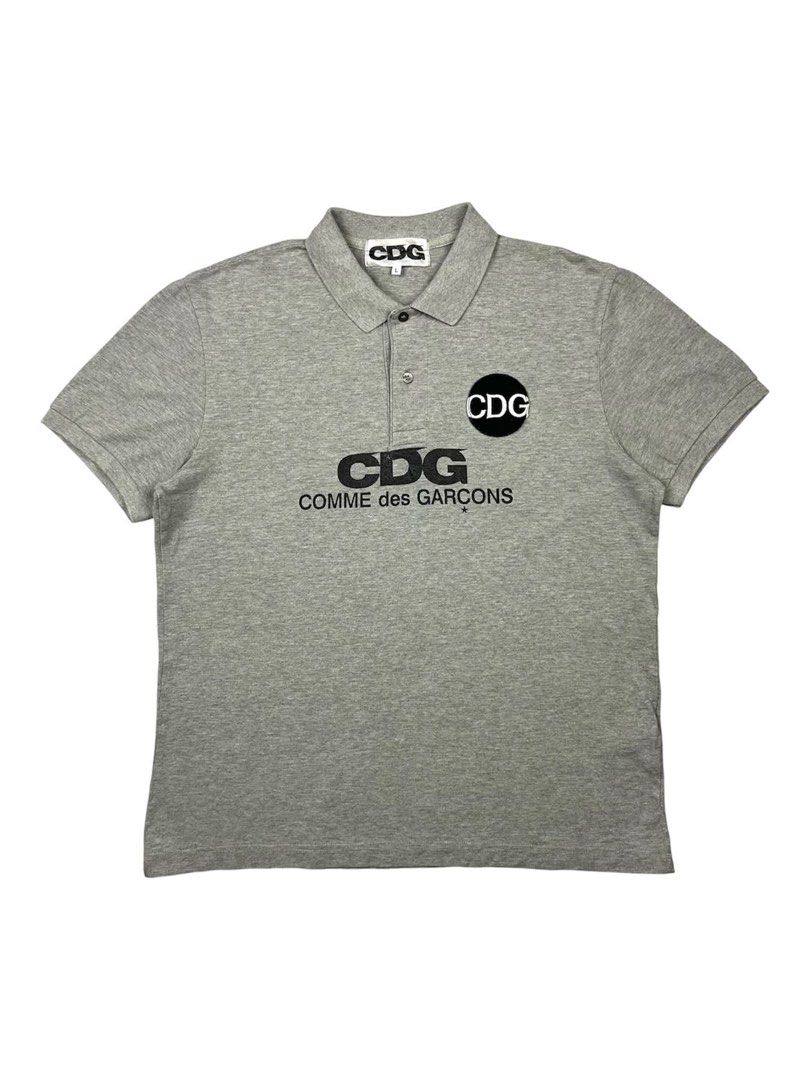CDG Comme des Garçons - Script S/S Polo Shirt (Category: Tshirts & Polo Shirts ) located in Puerto Princesa. Submitted by rrugsgallery (Listing ID 1467330594, Image 1). Description: CDG Comme des Garçons - Script S/S Polo Shirt Tagged Size: Large Length: 26.5 Width: 21 Condition: Very good Color rate: 9.5 Flaws: Minor sign of usage .