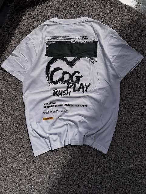 CDG Play White Tee (Category: Luxury Apparel) located in Caloocan City. Submitted by tlgroove (Listing ID 1467215100, Image 1). Description: .