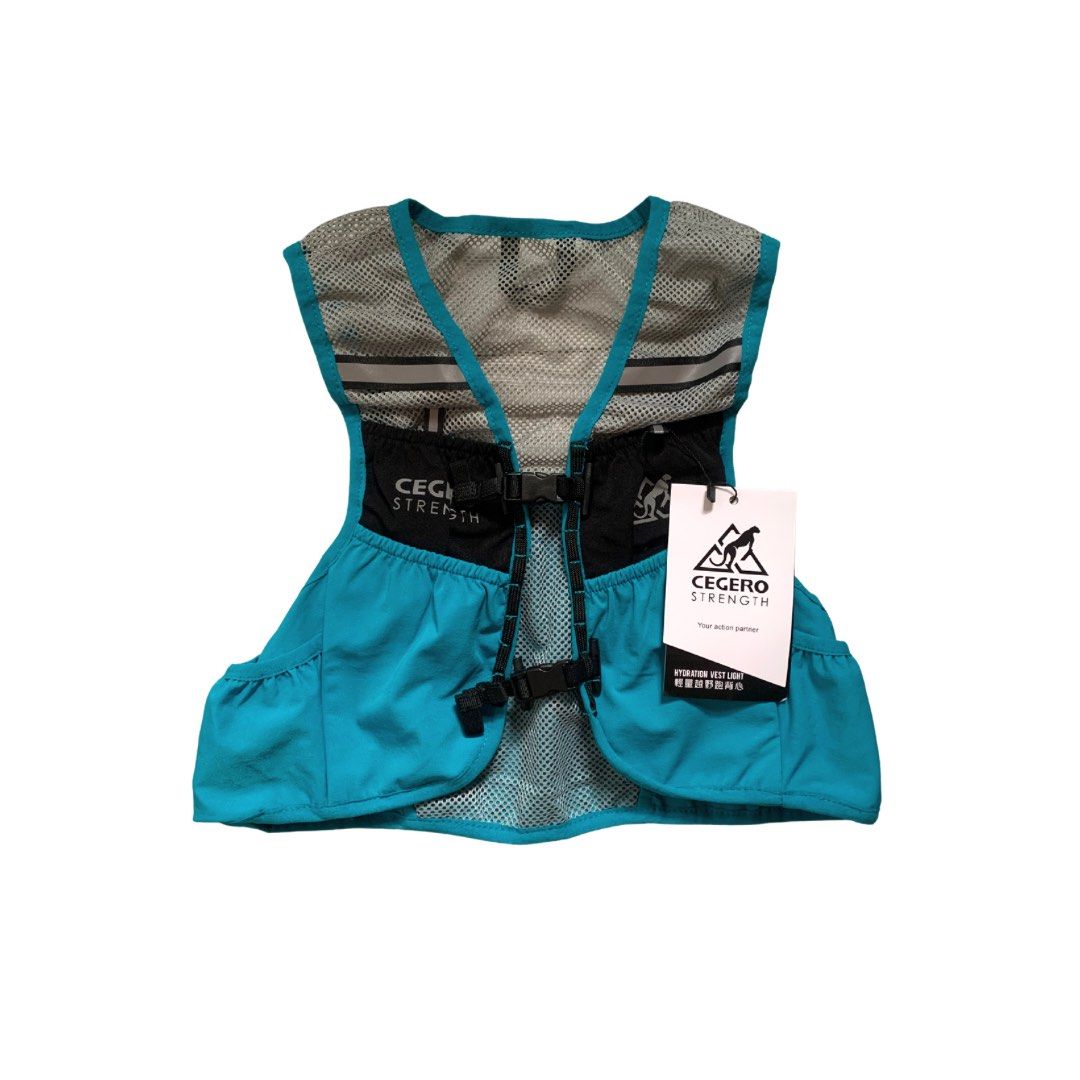 Cegero Strength Light Hydration Vest Running Backpack (Category: Other Sports Equipment and Supplies) located in Quezon City. Submitted by lijikore (Listing ID 1467176508, Image 1). Description: - Cegero Strength 4L hydration vest (bnwt) - Bright turquoise blue with black chest pockets and grey mesh panels - Dual adjustable buckle closure across the front for a secure fit - with minor flaw: please see 3rd photo (you can have it repaired) .