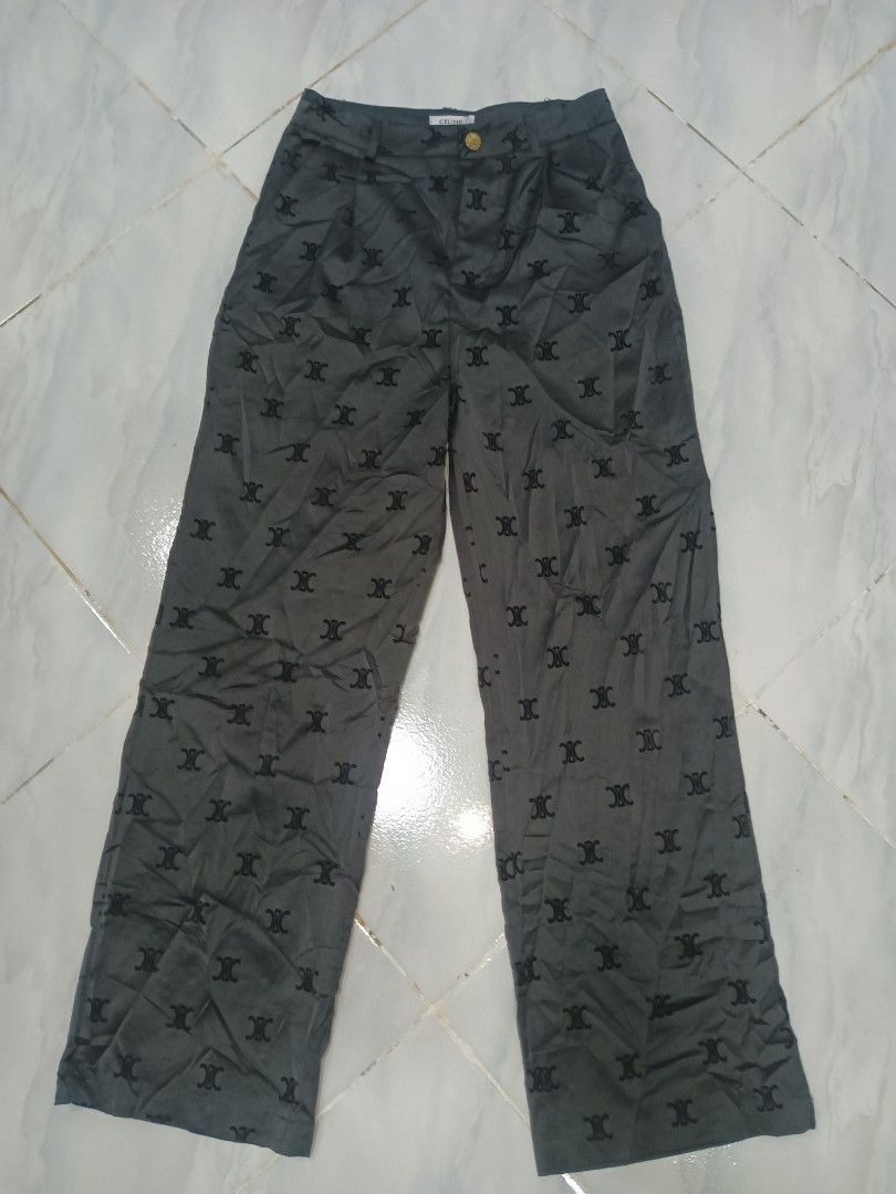 Celine Monogram Print Wide Leg Pants (Category: Jeans) located in Jolo. Submitted by zah-zah (Listing ID 1467317722, Image 1). Description: - Brand: Celine - Style: Wide leg pants with pleated front - Color / Pattern: Dark grey with allover monogram - Details: Branded gold-tone button closure, interior branding tags, Japanese care label - Material: 100% cotton - Care: Dry clean only - Condition: Excellent pre-loved condition (DM for exact measure