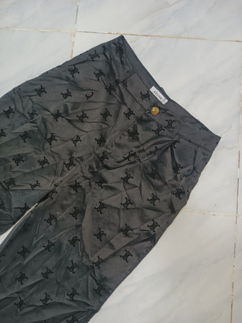 Celine Monogram Print Wide Leg Pants (Category: Jeans) located in Jolo. Submitted by zah-zah (Listing ID 1467317722, Image 3). Description: - Brand: Celine - Style: Wide leg pants with pleated front - Color / Pattern: Dark grey with allover monogram - Details: Branded gold-tone button closure, interior branding tags, Japanese care label - Material: 100% cotton - Care: Dry clean only - Condition: Excellent pre-loved condition (DM for exact measure