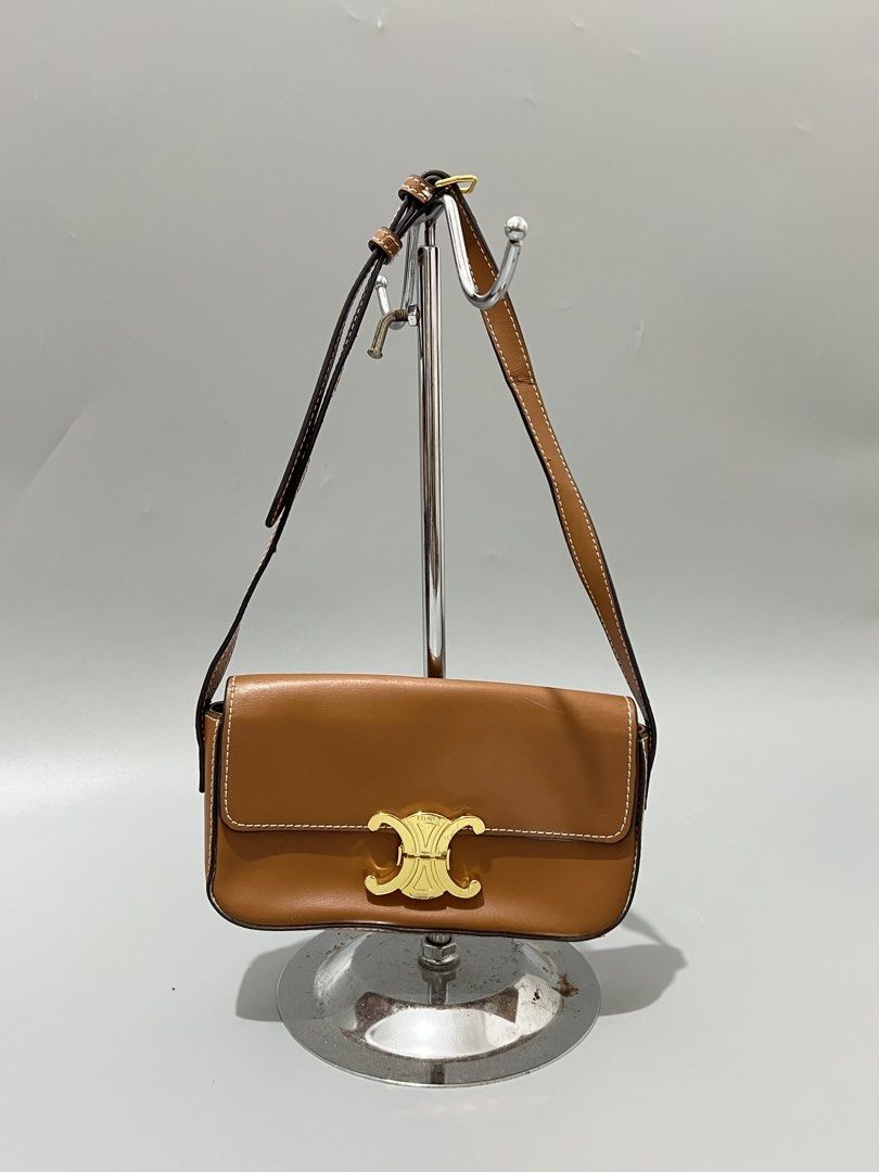 Celine -Triomphe - 2 way - Crossbody & Shoulder (Category: Shoulder Bags) located in Cavite. Submitted by asianluxe (Listing ID 1467267969, Image 1). Description: Celine - Triomphe bag - 2 way - Shoulder & Crossbody Measurements! Length:13 Cm Width:21 Cm Depth:4.5 Cm Good condition Very presentable 9/10 condition If u interested, Drop your offer , Let’s Negotiate!.