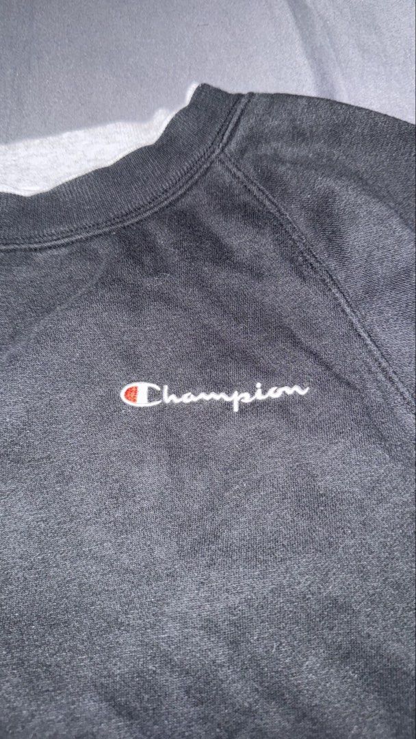 Champion Black Cropped Drawstring Sweatshirt (Category: Coats, Jackets and Outerwear) located in Andop. Submitted by nobleangel (Listing ID 1467309861, Image 2). Description: - Authentic Black Champion sweatshirt - Size: Medium (USA, CA, MEX) / Large (Asia) - Features contrast gray inner collar trim - Embroidered script logo on chest and classic C patch on left sleeve - Adjustable drawstring hem with metal aglets - Comfortable raglan sleeves - Ma