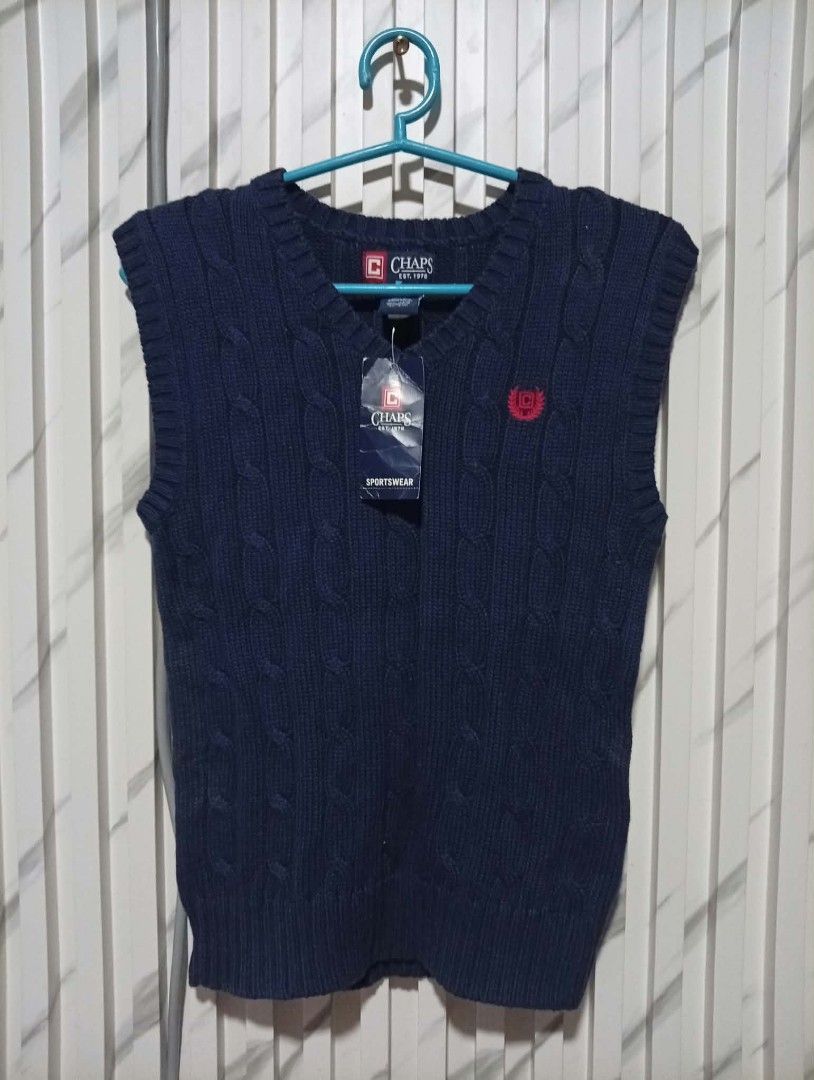 Chaps Knitted Vest womens with hangtag ( Authentic ) (Category: Coats, Jackets and Outerwear) located in Barotac Nuevo. Submitted by john.pritz (Listing ID 1467323743, Image 1). Description: Chaps Knitted Vest womens with hantag ( Authentic ) Like new condi no issue Size 7 on tag Width 14 to stretch 18 pasok Length 22.