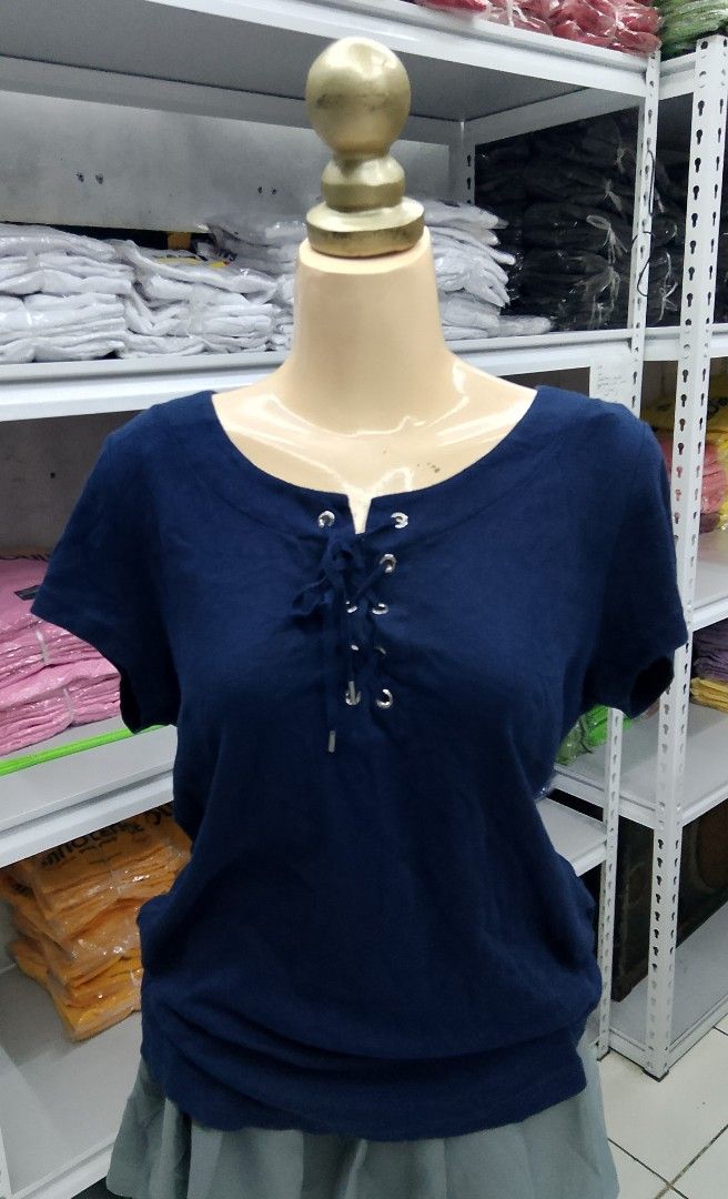 Chaps Navy Blue Lace-Up Short Sleeve Top (Category: Shirts) located in Midsayap. Submitted by jarethshop (Listing ID 1467319650, Image 1). Description: - Brand/Model: Chaps navy blue top - Size: L - Details: Short sleeves, lace-up neckline with silver metal grommets, contrast chambray inner collar trim - Style: Casual everyday wear - Origin: Made in India - Condition: Clean and ready to wear.