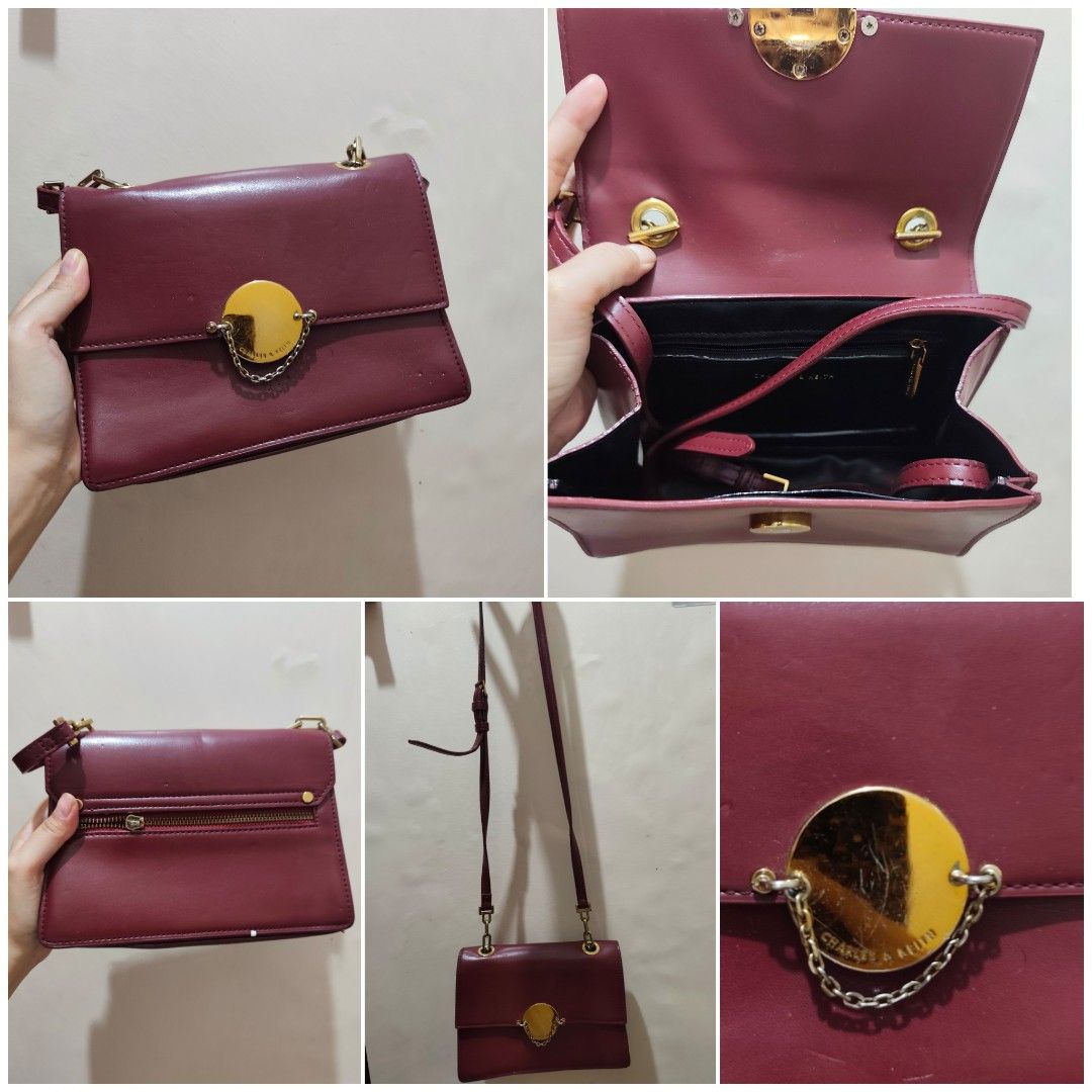 Charles and Keith maroon sling bag (Category: Cross-body Bags) located in Makati City. Submitted by ainayabs (Listing ID 1467342704, Image 1). Description: - bought via thrift shop - with sign of usage but still in good condition.