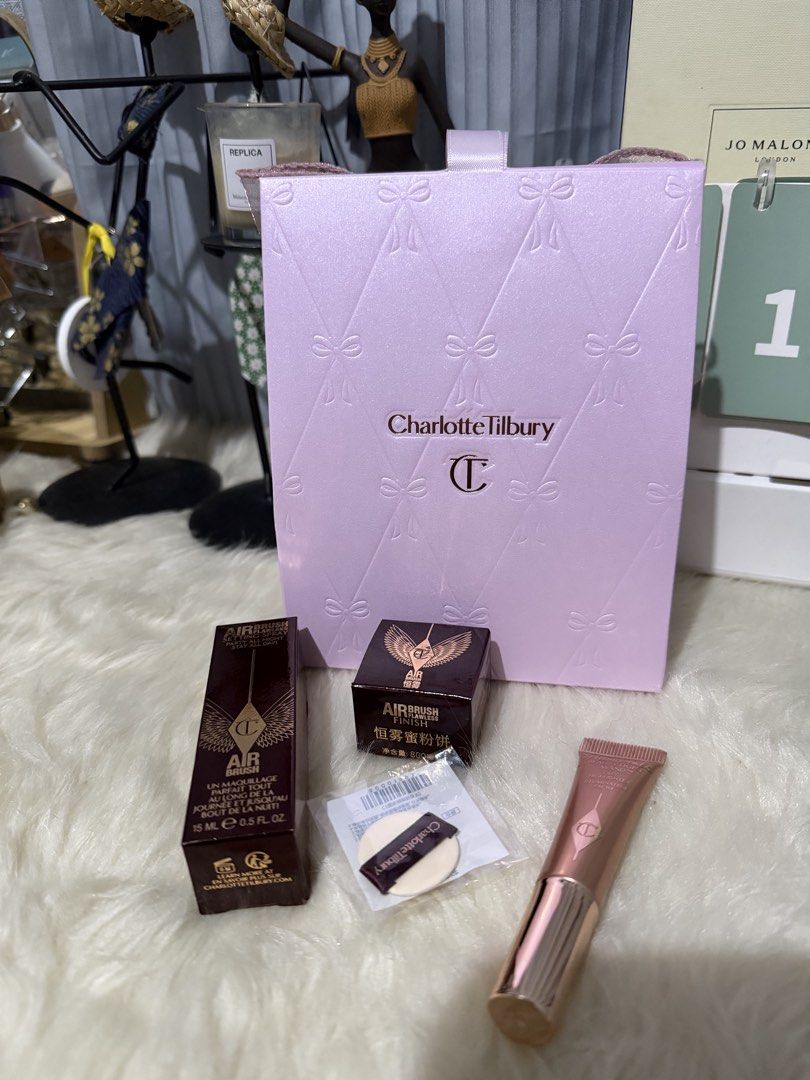 CHARLOTTE TILBURY GIFT SET (Category: Makeup) located in Las Pinas. Submitted by mystic_tragicallychic (Listing ID 1467036510, Image 3). Description: 🎀 CHARLOTTE TILBURY GIFT SET🎀 Perfect for gifting or a little treat for yourself!💄 🎁 4-Piece Set with Limited Edition Packaging Set includes: * Setting Spray — 15ml * Pillow Talk Light Wand Highlighter — 5ml * Setting Powder with Puff * Limited Edition Ribbon Packaging 🎀 📸 Actual product photo