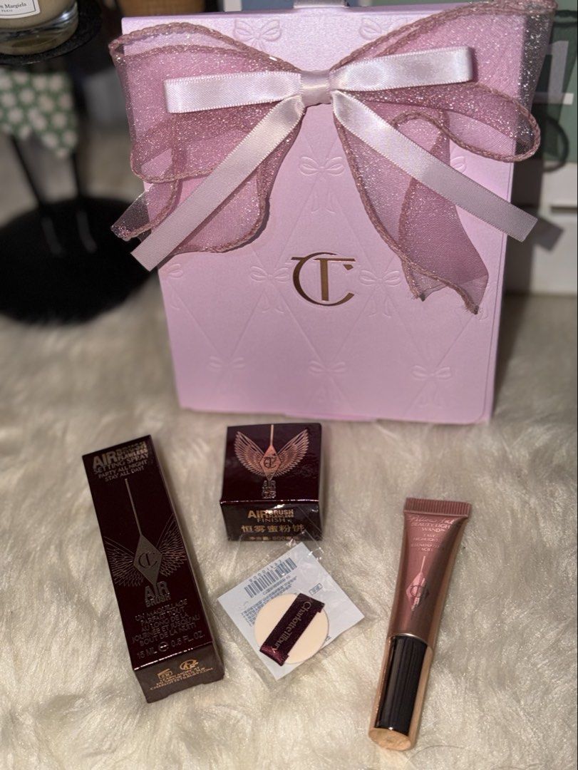 CHARLOTTE TILBURY GIFT SET (Category: Makeup) located in Las Pinas. Submitted by mystic_tragicallychic (Listing ID 1467036510, Image 2). Description: 🎀 CHARLOTTE TILBURY GIFT SET🎀 Perfect for gifting or a little treat for yourself!💄 🎁 4-Piece Set with Limited Edition Packaging Set includes: * Setting Spray — 15ml * Pillow Talk Light Wand Highlighter — 5ml * Setting Powder with Puff * Limited Edition Ribbon Packaging 🎀 📸 Actual product photo