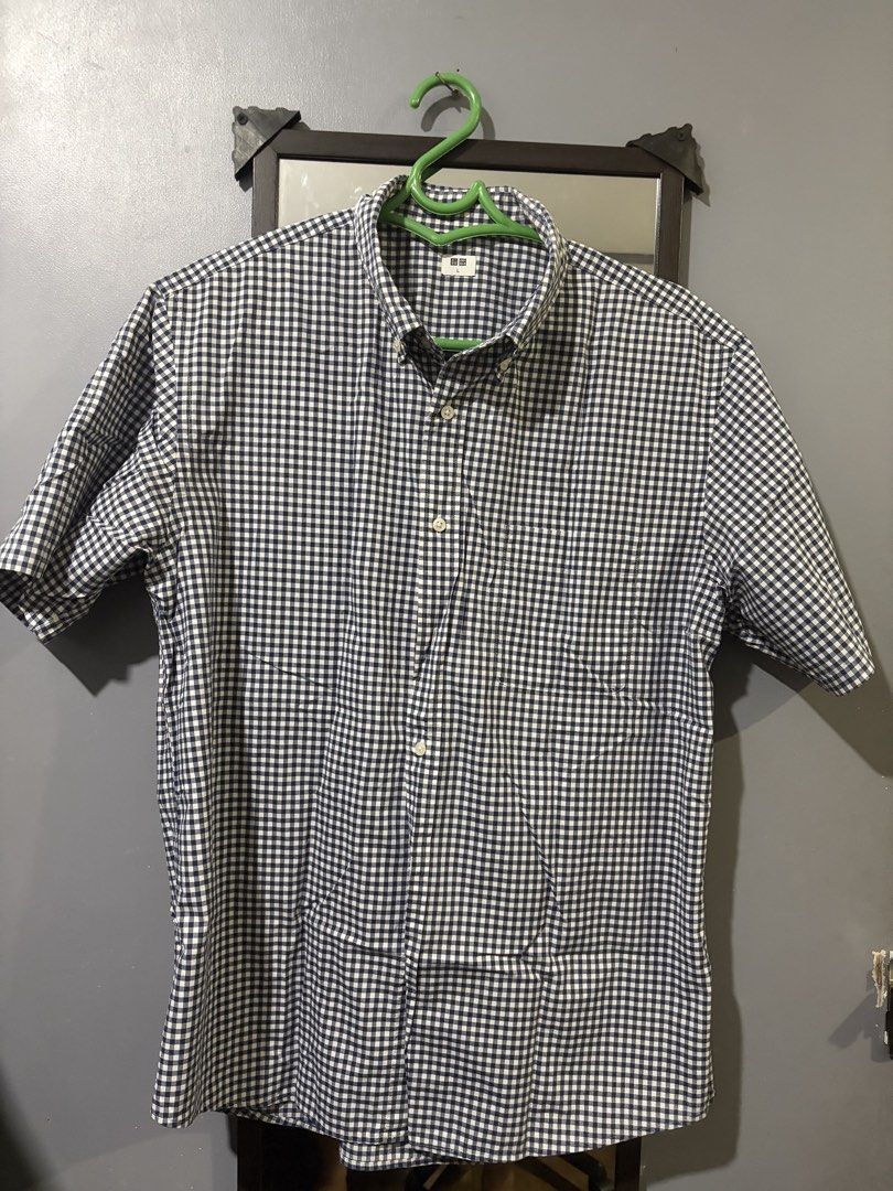 Checkered short sleeves from Uniqlo (Category: Formal Shirts) located in Manila. Submitted by mateo_06 (Listing ID 1394143007, Image 1). Description: Price still negotiable.