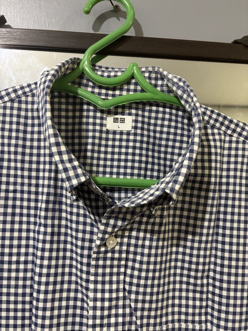 Checkered short sleeves from Uniqlo (Category: Formal Shirts) located in Manila. Submitted by mateo_06 (Listing ID 1394143007, Image 2). Description: Price still negotiable.