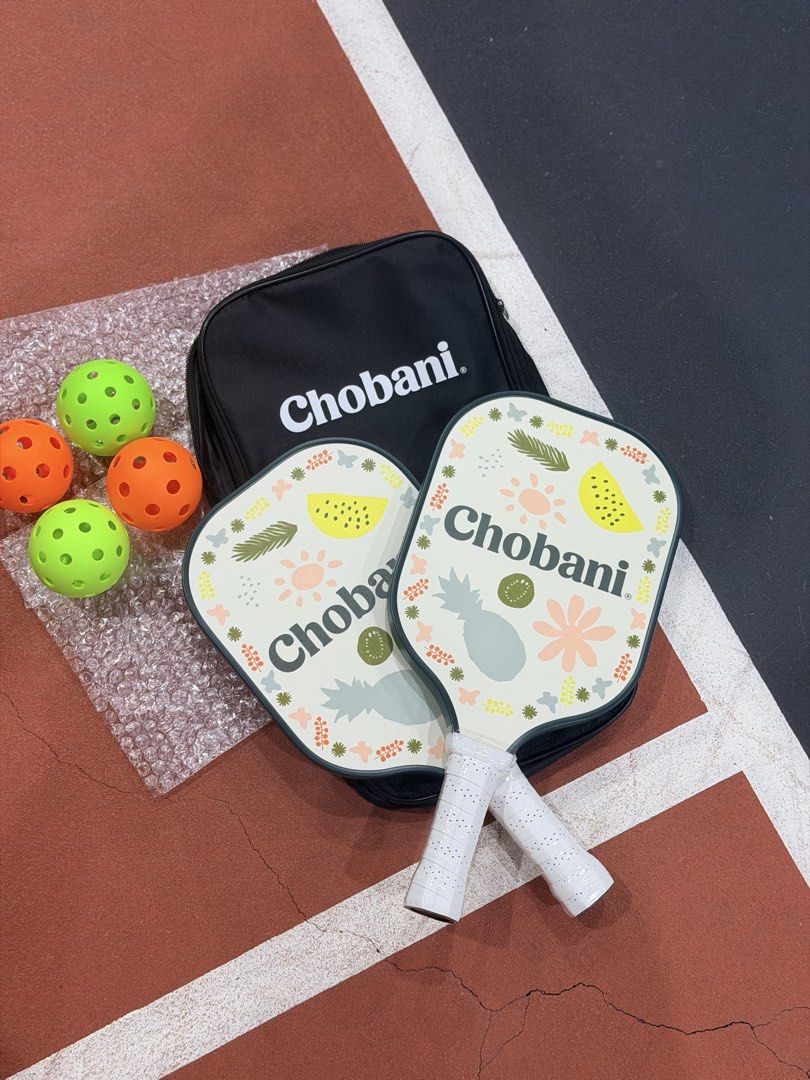 CHOBANI PICKLEBALL PADDLE (2pcs paddle with 4pcs pickle ball) (Category: Racket and Ball Sports) located in Quezon City. Submitted by mikxscollections (Listing ID 1467209841, Image 3). Description: CHOBANI PICKLEBALL PADDLE NEW NEVER BEEN USED -beginner friendly -2pcs paddle -with 4pcs pickle ball -with bag RFS: Extra. I have my own paddle SOLD AS SET .