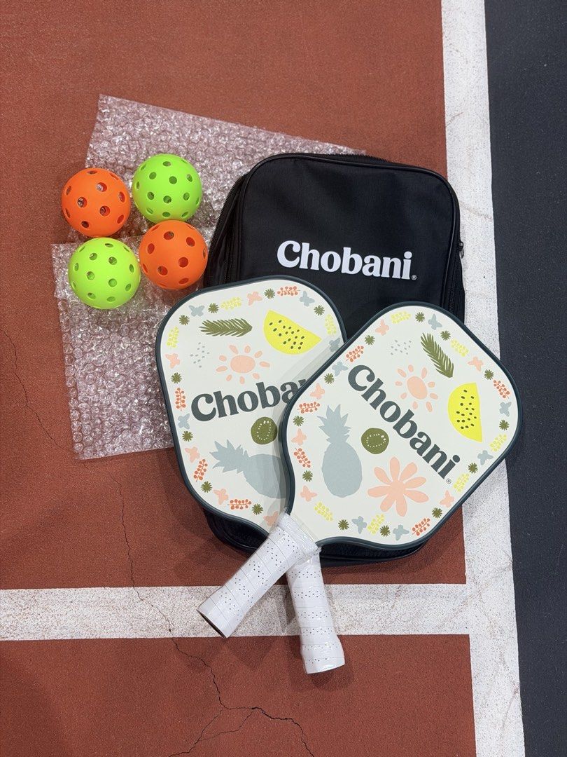 CHOBANI PICKLEBALL PADDLE (2pcs paddle with 4pcs pickle ball) (Category: Racket and Ball Sports) located in Quezon City. Submitted by mikxscollections (Listing ID 1467209841, Image 2). Description: CHOBANI PICKLEBALL PADDLE NEW NEVER BEEN USED -beginner friendly -2pcs paddle -with 4pcs pickle ball -with bag RFS: Extra. I have my own paddle SOLD AS SET .