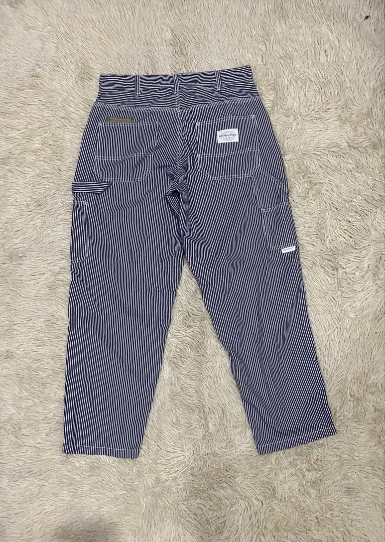 Chocolate Stripe carpenter Pants (Category: Jeans) located in Antipolo. Submitted by switchneighborhood (Listing ID 1467270667, Image 3). Description: - Brand: Chocolate - Style: Blue and white hickory stripe cargo pants - Size: S (tagged on waistband) sz 31-32 - Features: Utility pockets, side hammer loop, multiple rear pockets, button closure with belt loops - Condition: Clean, no obvious stains or flaws.