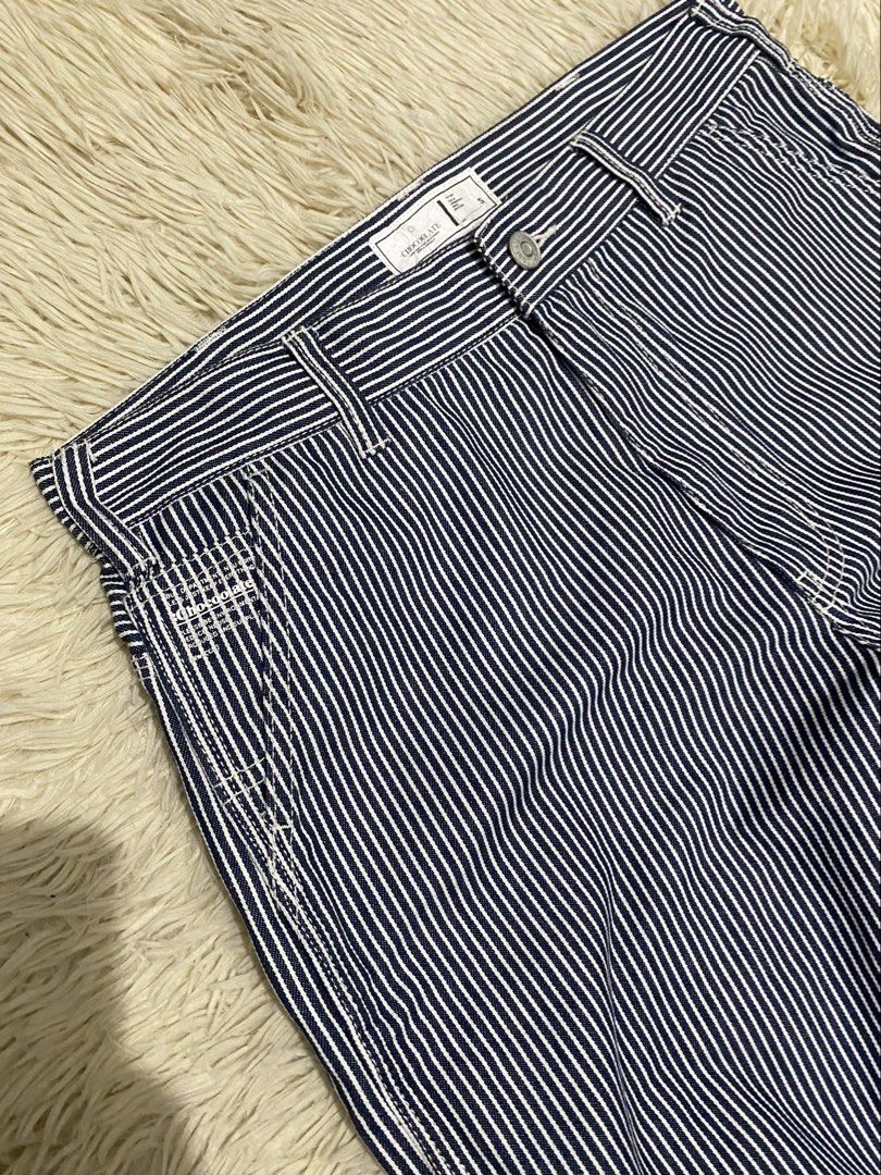 Chocolate Stripe carpenter Pants (Category: Jeans) located in Antipolo. Submitted by switchneighborhood (Listing ID 1467270667, Image 2). Description: - Brand: Chocolate - Style: Blue and white hickory stripe cargo pants - Size: S (tagged on waistband) sz 31-32 - Features: Utility pockets, side hammer loop, multiple rear pockets, button closure with belt loops - Condition: Clean, no obvious stains or flaws.