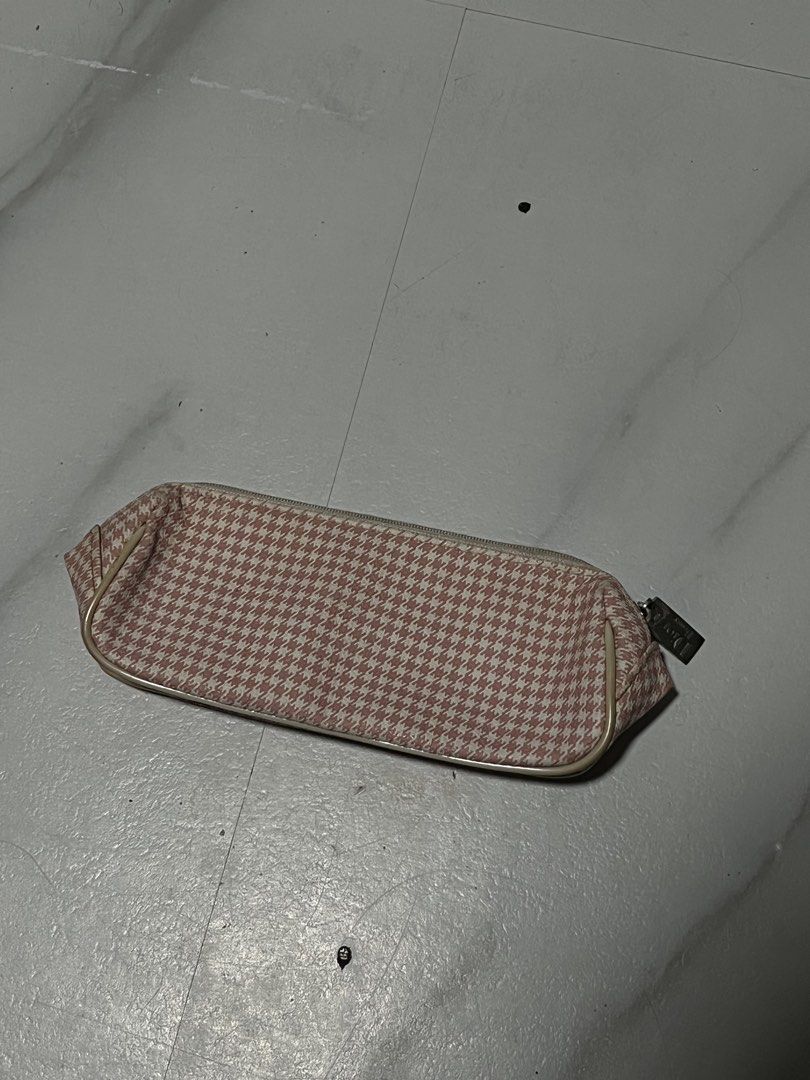 Christian Dior Beauty Houndstooth Makeup Pouch (Category: Purses & Pouches) located in Manila. Submitted by randomloots2 (Listing ID 1467207951, Image 2). Description: - Brand: Dior Beauty - Design: Pink & white houndstooth pattern with embroidered oval logo on front - Closure: Zip closure with branded metal zipper pull - Interior: Cream lining with official serial number tag (F092225210) - Origin: Made in China - Condition: Brand new / unused - 