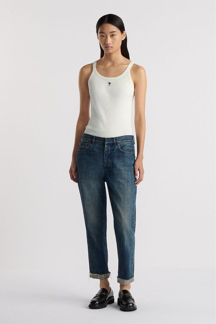 CHRISTIAN DIOR WHITE RIBBED TANK TOP (Category: Luxury Apparel) located in General Trias. Submitted by kyledeterala6969 (Listing ID 1467285104, Image 2). Description: Christian Dior Top No issue Like new Color rate - 10/10 Length - 22 Pit to pit - 13 Stretchable Location: General Trias City, Cavite.