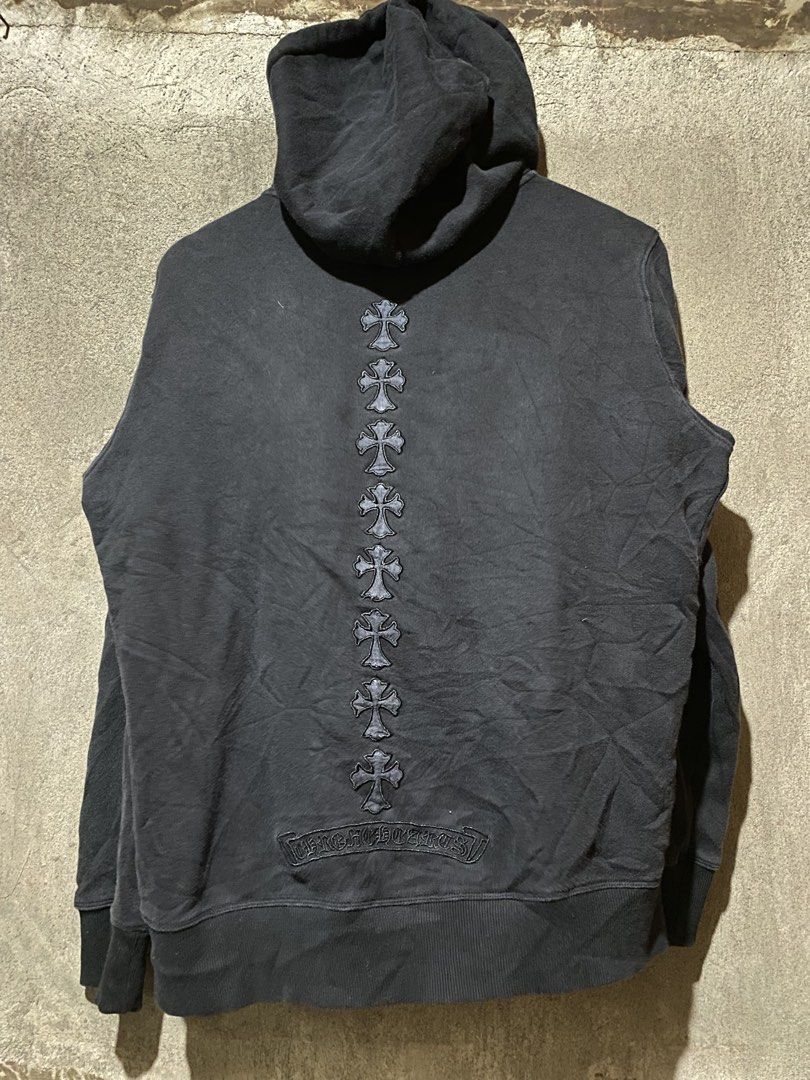 Chrome Hearts Cross Patch Zip-Up Hoodie Black (Category: Hoodies) located in Manila. Submitted by krip_thrift (Listing ID 1467249231, Image 2). Description: Chrome Hearts zip-up hoodie in black. Heavy cotton fabric with multiple cross patches running down the back. Triple cross embroidery on the left chest and CH logo near the front pocket. Silver dagger zipper pull and engraved aglets on the drawstrings. Inner neck tag attached. best fit: medium