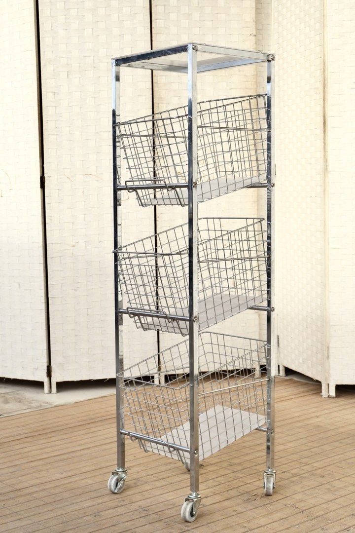 Chrome Metal Wire Storage Cart with Wheels (Category: Storage Boxes & Baskets) located in Bulacan. Submitted by FurnitureGallery (Listing ID 1467304617, Image 3). Description: - Chrome finish metal frame with a sturdy build - Features 3 wire baskets and 1 top shelf for ample storage - Equipped with 4 smooth-rolling swivel castor wheels for easy mobility - Perfect for organizing kitchen items, bathroom accessories, or office supplies JAPAN SURPLUS