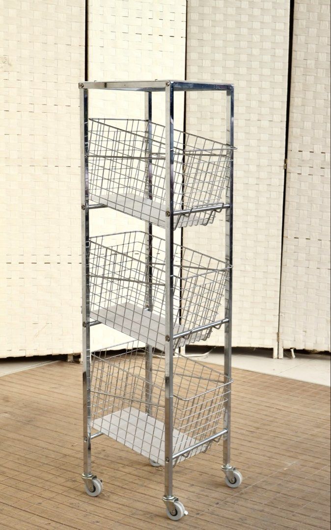Chrome Metal Wire Storage Cart with Wheels (Category: Storage Boxes & Baskets) located in Bulacan. Submitted by FurnitureGallery (Listing ID 1467304617, Image 2). Description: - Chrome finish metal frame with a sturdy build - Features 3 wire baskets and 1 top shelf for ample storage - Equipped with 4 smooth-rolling swivel castor wheels for easy mobility - Perfect for organizing kitchen items, bathroom accessories, or office supplies JAPAN SURPLUS