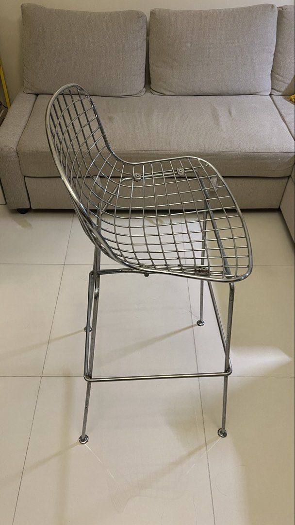 Chrome Wire Grid Bar Stool Modern Industrial Chair (Category: Chairs) located in Muntinlupa City. Submitted by antawncampos (Listing ID 1467318302, Image 3). Description: - Style: Modern industrial chrome wire bar stool with a trendy grid design - Build: Sturdy, heavy metal construction with a clean, polished finish - Features: High metal legs equipped with a built-in footrest bar - Condition: Great for use, with only minor signs of handling near