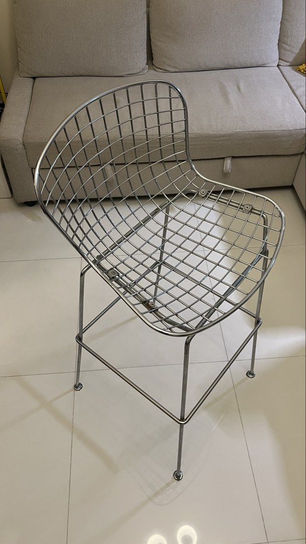 Chrome Wire Grid Bar Stool Modern Industrial Chair (Category: Chairs) located in Muntinlupa City. Submitted by antawncampos (Listing ID 1467318302, Image 1). Description: - Style: Modern industrial chrome wire bar stool with a trendy grid design - Build: Sturdy, heavy metal construction with a clean, polished finish - Features: High metal legs equipped with a built-in footrest bar - Condition: Great for use, with only minor signs of handling near