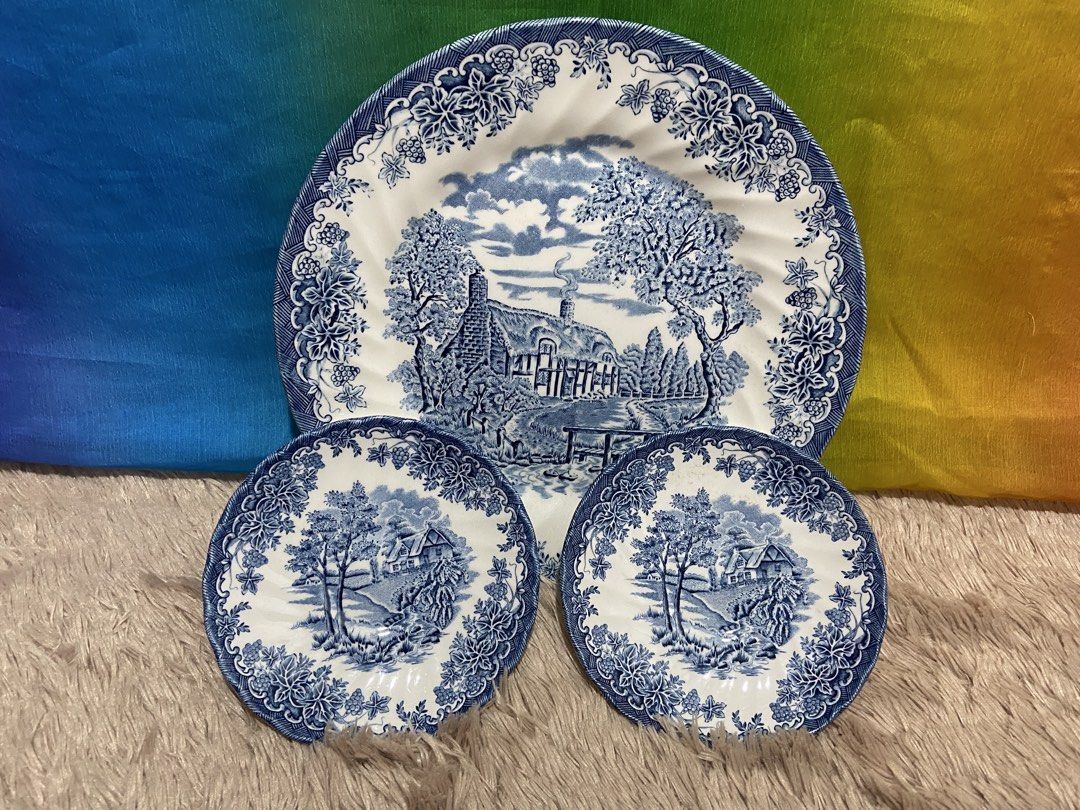 chruchill dinner plate and sacer (Category: Dinnerware & Cutlery) located in Pasig City. Submitted by jie_russ (Listing ID 1467186687, Image 1). Description: - 3-piece blue and white ceramic set: 1 large dinner plate and 2 side plates - Charming traditional cottage countryside landscape design - Detailed grape vine borders with elegant scalloped edges - Exact measurements shown in the photos using a tape measure - Great addition to any vintage ta
