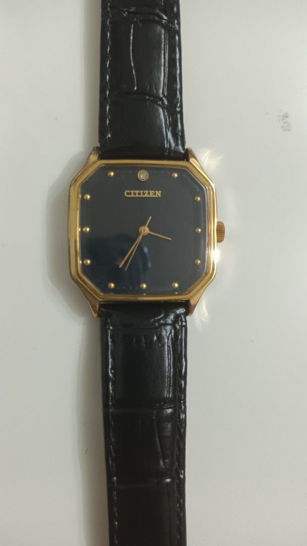 Citizen Vintage Gold-Tone watch (Category: Women's Watches) located in Manila. Submitted by elytoot_1891 (Listing ID 1467247809, Image 1). Description: - Brand: Citizen mechanical watch hand winding - Style: Vintage classic dress watch - Dial: Striking black octagonal face with minimalist dot markers and slim gold hands - Case: Gold-tone with stainless steel back and clear serial numbers - Strap: Genuine Italian black leather strap with silver-to