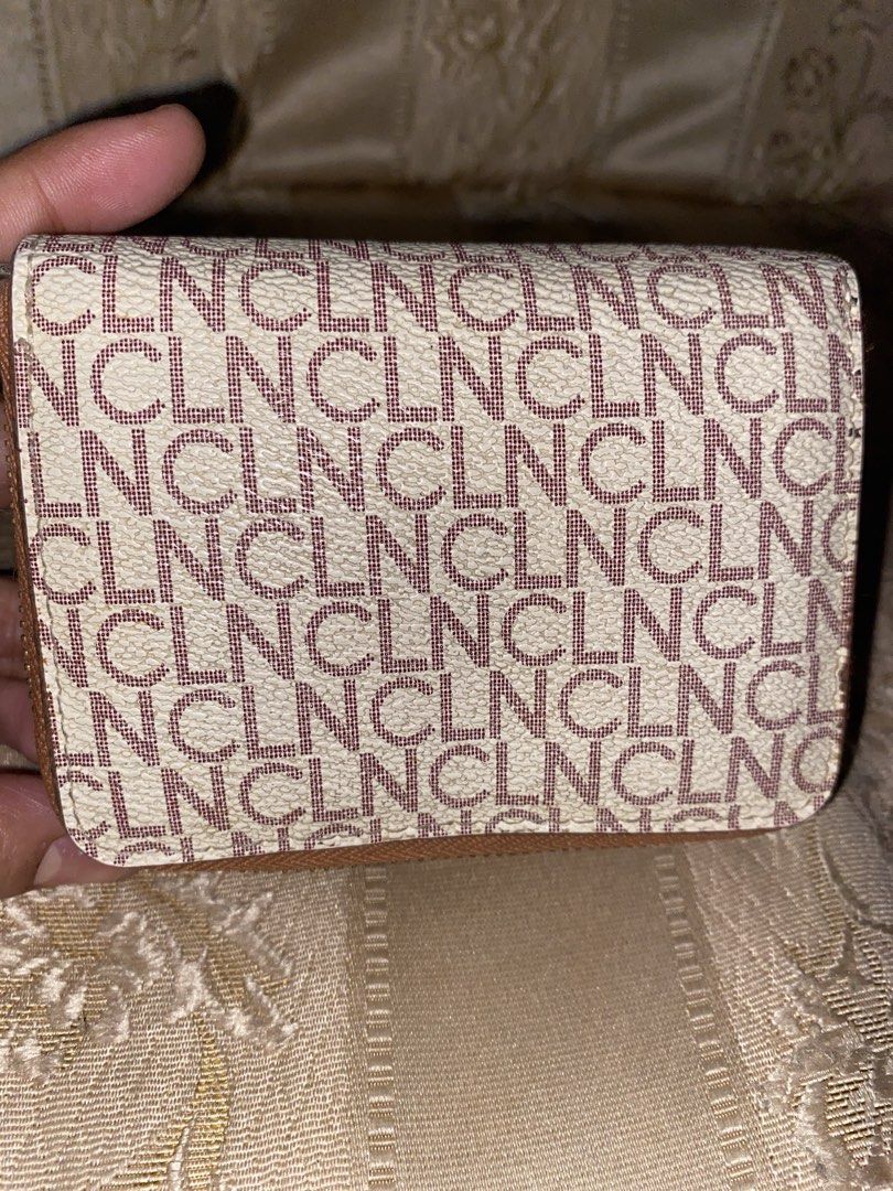 CLN Wallet (Category: Wallets & Card holders) located in Manila. Submitted by trixxxyyy06 (Listing ID 1467250033, Image 3). Description: Slightly used CLN Wallet flaws ( noticeable ) but zipper still working Pm me if you're interested.