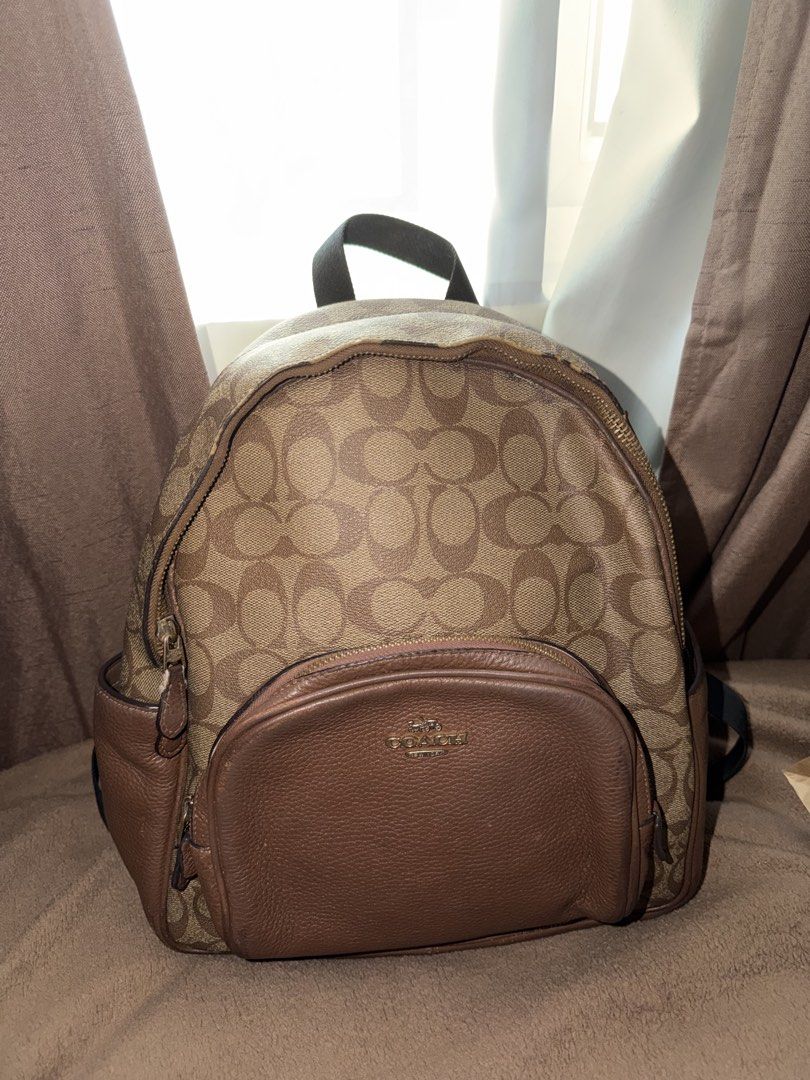 Coach backpack (Category: Backpacks) located in Cagayan de Oro. Submitted by lorraine27 (Listing ID 1467291573, Image 1). Description: - ALL ZIPPER IS WORKING - BAWAL SA MGA MASESELAN - SEE THE PICS FOR ISSUE - BUY AT YOUR OWN RISK MOP: GCASH MOD: J&T.
