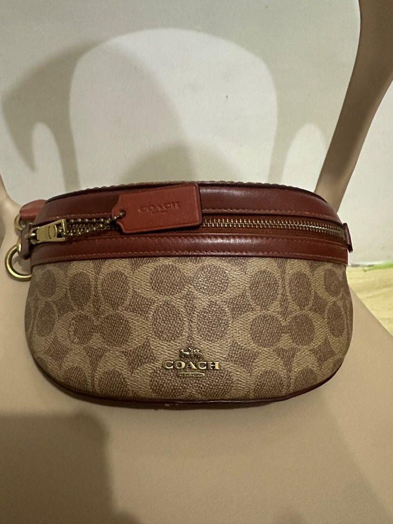 COACH BETHANY BELT BAG (Category: Belt bags, Clutches and Pouches) located in Caloocan City. Submitted by pjames02 (Listing ID 1467362008, Image 1). Description: COACH BETHANY BELT BAG Product Details: The Coach Bethany Belt Bag combines signature style with practicality. Adjustable strap for versatile wear at the waist. Complete with gold hardware, this bag is both functional and fashionable. Brand : Coach Type : CI184 Details : Signature coated
