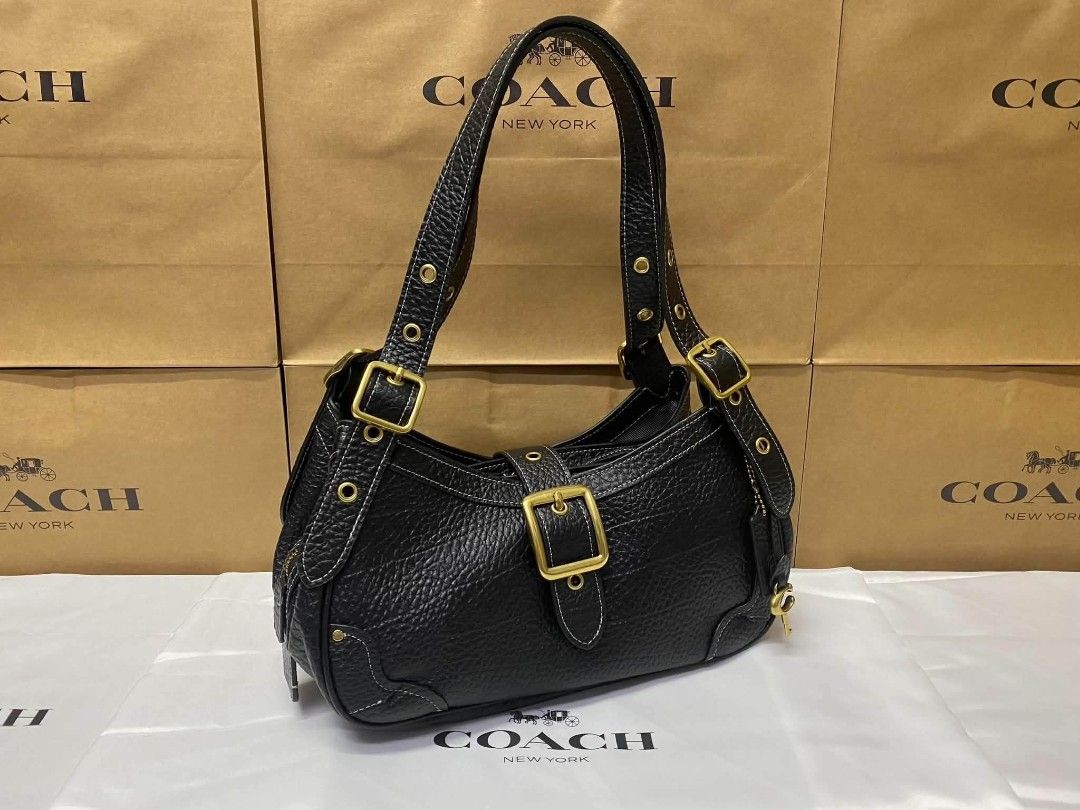 Coach Drifter Shoulder Bag 30x14cm (Category: Shoulder Bags) located in Manila. Submitted by fashionbags_21 (Listing ID 1467230830, Image 3). Description: - Brand: Coach Drifter shoulder bag - Dimensions: 30 x 14 cm - Material: Premium pebble leather with brass hardware - Colors available: Black, Brown, Tan - Features: Front flap closure, secure zipper closure, interior compartments, buckled straps, and adjustable shoulder straps - Inclusions: Ha