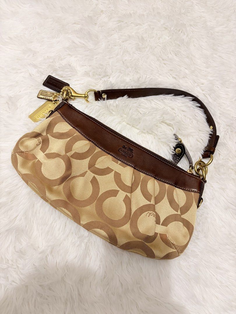 Coach Madison Brown Shoulder Bag (Category: Luxury Bags & Wallets) located in General Santos City (Dadiangas). Submitted by thriftqueen5897 (Listing ID 1467248237, Image 1). Description: Cracked creed.