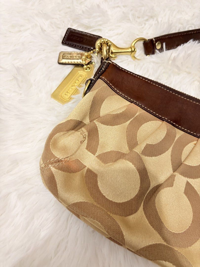 Coach Madison Brown Shoulder Bag (Category: Luxury Bags & Wallets) located in General Santos City (Dadiangas). Submitted by thriftqueen5897 (Listing ID 1467248237, Image 2). Description: Cracked creed.