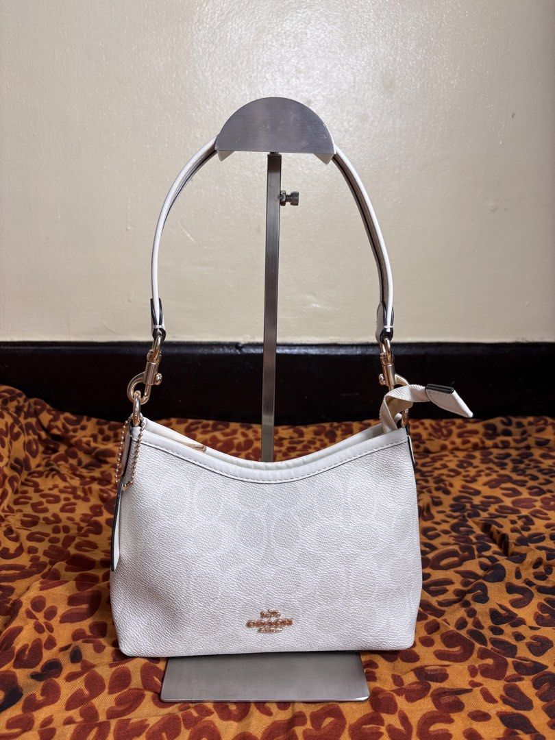 Coach Shoulder Bag (Category: Shoulder Bags) located in Manila. Submitted by earlylifecrisis3 (Listing ID 1467251182, Image 1). Description: Condition 9/10 Measure it by inch Width: 9 Length: 5.5 Depth: 3.2 Handle:9 •Refund / Returns not allowed allowed •Please do check the dimensions size on labels sometimes are not accurate on the sizing •Ask me before purchasing.