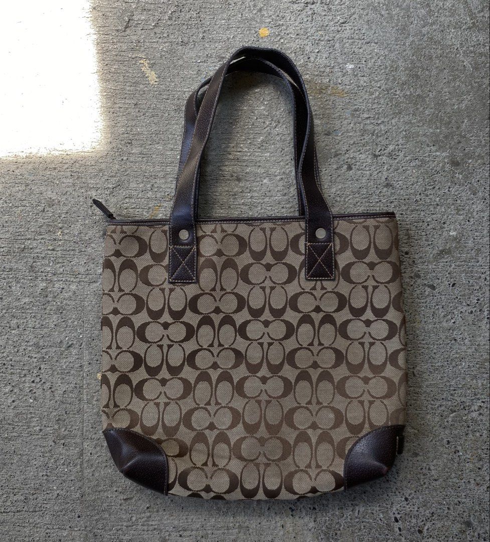 Coach Signature Brown Monogram Shoulder Bag (Category: Luxury Bags & Wallets) located in Kalibo. Submitted by bryaninosa20819 (Listing ID 1467179139, Image 1). Description: Coach Signature Brown Monogram Shoulder Bag Dimes : 14x13 Very Good Condition Color Rate 9.8/10 📍Location : Kalibo, Aklan Nature Thrift 📩📩📩📩.
