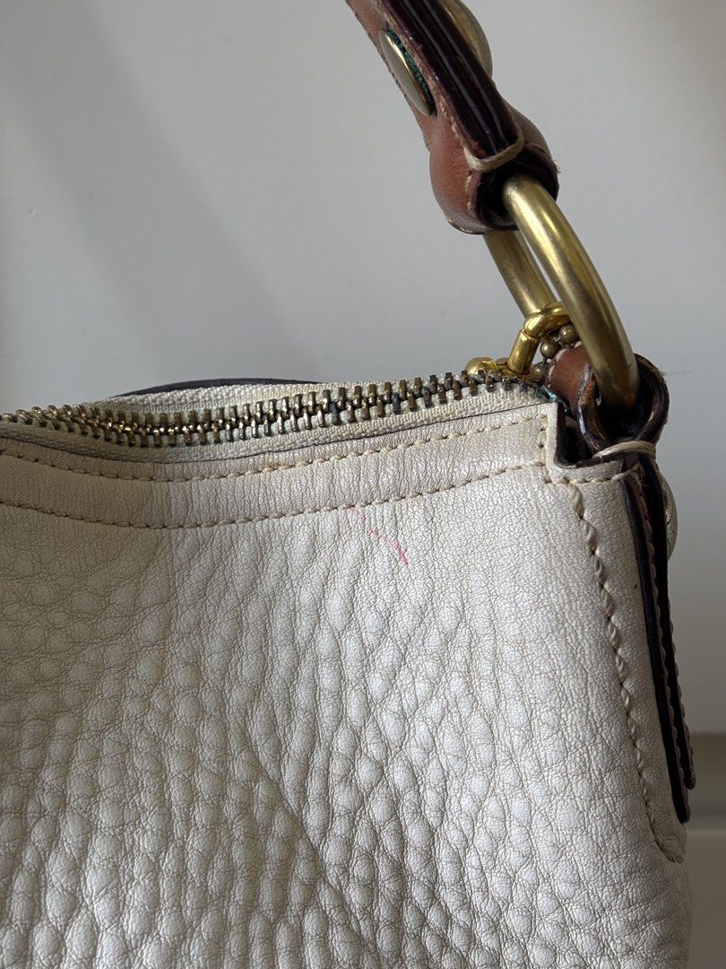Coach Soho White Pebbled Leather Hobo (Category: Luxury Bags & Wallets) located in Manila. Submitted by vintage.maem (Listing ID 1467324572, Image 3). Description: CCH Soho White Pebbled Leather Hobo Code: 11838 *𝘤𝘩𝘢𝘳𝘮 𝘯𝘰𝘵 𝘪𝘯𝘤𝘭𝘶𝘥𝘦𝘥* Condition: 7.6/10 Rank B Mine: ₱1999 ⚠️ Signs of wear on leather, minimal pen mark (see 3rd photo), rubber lining issue near handle (see 4th photo), dirt on inner lining near zippers (see 5th and 6th p