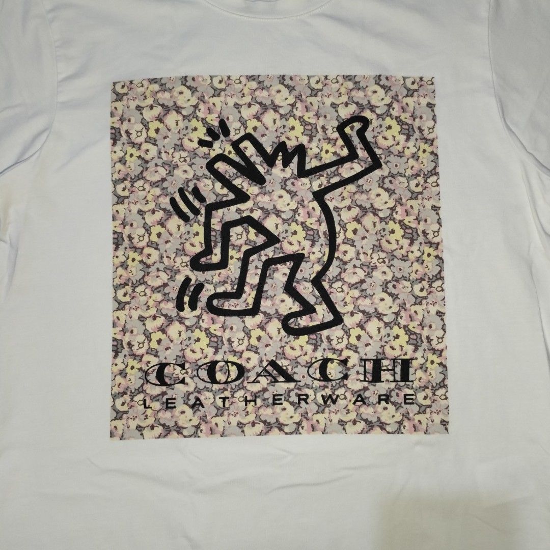 COACH x KEITH HARING COLLABORATION SHIRT (Category: Blouses) located in Manila. Submitted by friperie. (Listing ID 1467250553, Image 3). Description: color rate 9/10 print 10/10 dimes 17 x 22 issue none with tags and wash tags Disclaimer: Product Color May Slightly Vary Due to Photographic Lighting Sources or Your Monitor Settings Dm for other pictures or details..