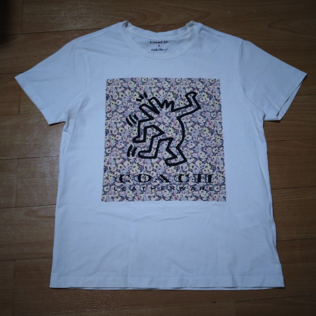 COACH x KEITH HARING COLLABORATION SHIRT (Category: Blouses) located in Manila. Submitted by friperie. (Listing ID 1467250553, Image 2). Description: color rate 9/10 print 10/10 dimes 17 x 22 issue none with tags and wash tags Disclaimer: Product Color May Slightly Vary Due to Photographic Lighting Sources or Your Monitor Settings Dm for other pictures or details..