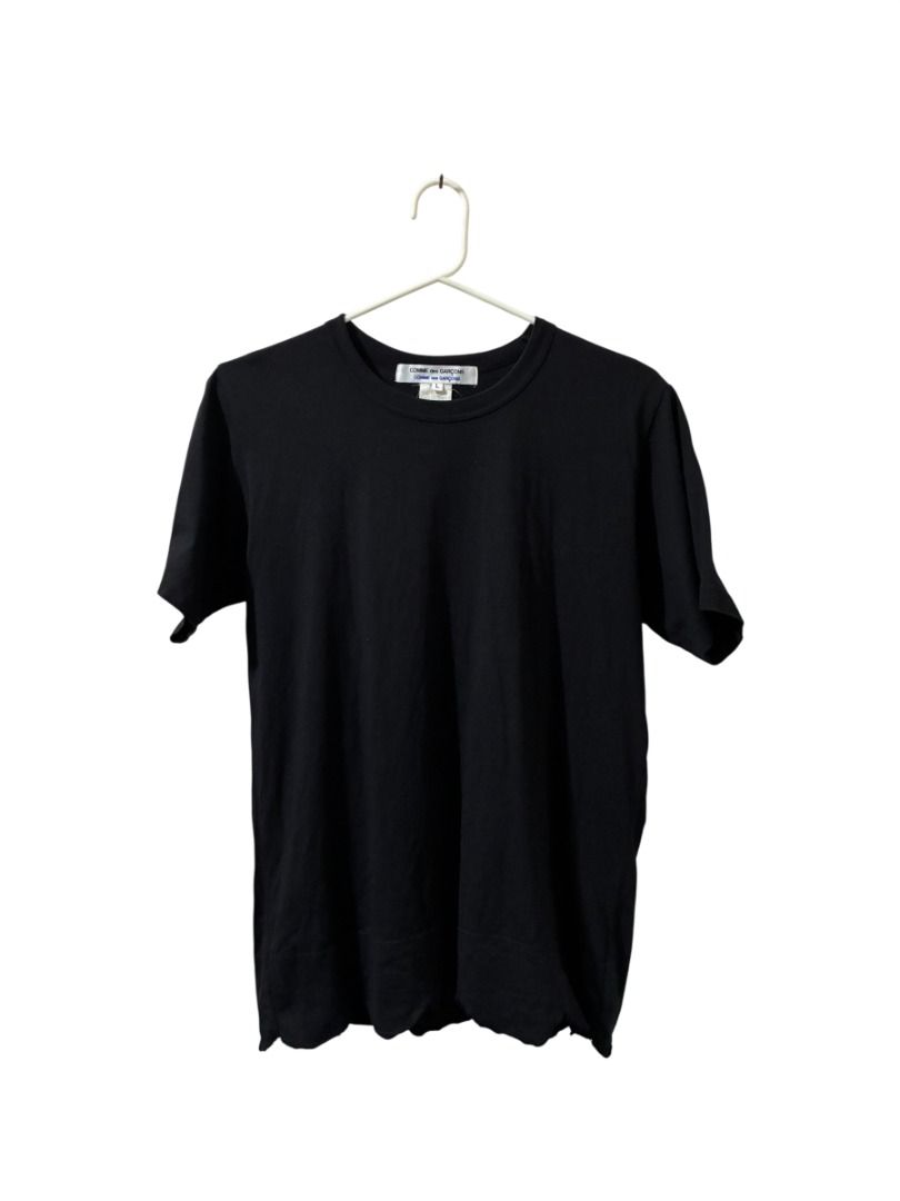 Comme des Garcons Patterned Hem T-shirt (Category: Luxury Apparel) located in Santo Tomas. Submitted by tamins.thrifts (Listing ID 1467357937, Image 1). Description: Condition: 9/10 Color Rate: 9/10 Dimensions: 18 x 25 Issue/s:.