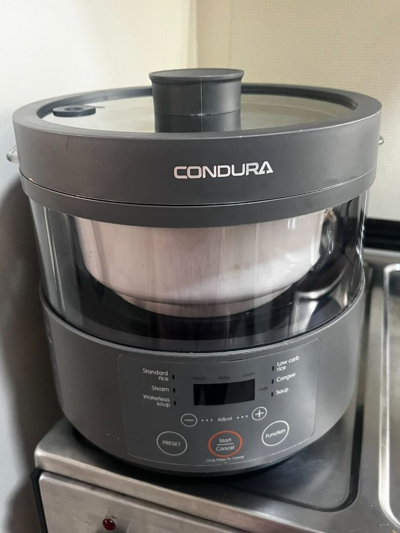 Condura Multicooker (Category: Cookers) located in Caloocan City. Submitted by mjting01 (Listing ID 1467293100, Image 1). Description: - Brand: Condura Digital Multi Cooker - Color: Sleek Dark Grey - Multi-Function: Standard rice, low carb rice, steam, waterless soup, congee, and soup - Control Panel: Easy-to-use digital display and simple buttons for preset, start, cancel, and function adjustment - Inclusions: Inner cooking pot and glass lid wit