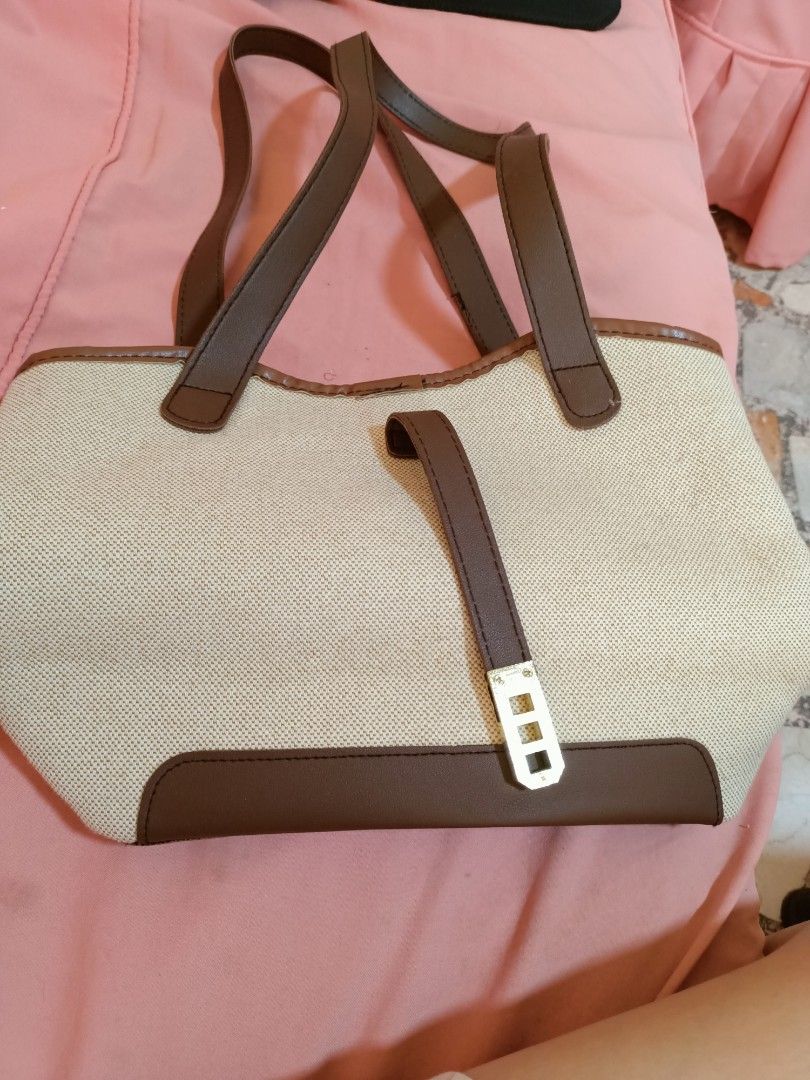 Contrast Color Strap Shoulder Bag Brown Beige (Category: Shoulder Bags) located in Imus. Submitted by reynes.mei79 (Listing ID 1467201818, Image 2). Description: Very good condition Php 465 sa Shein, for sale Php 200 Once lang po nagamit, no flaws For sale din: Champion Sneakers from USA Good condition - Php 150 Black and white / Size 5 ( see photos ) Lalabhan na lang po Take all din po Budget Wallet at Wooden Foot File - Php 200.