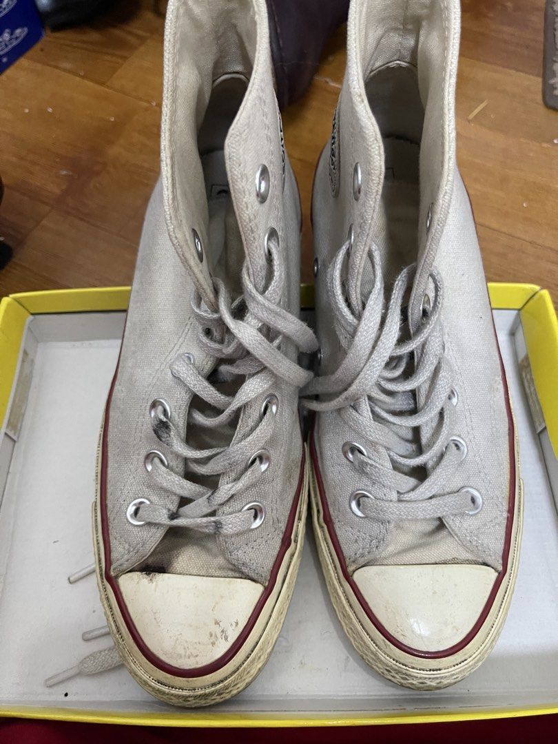 Converse Chuck 70 High Top Parchment (Category: Sneakers) located in Taguig. Submitted by 1307maloc (Listing ID 1467213639, Image 1). Description: - Item: Converse Chuck 70 High Top - Color: Parchment Off-White - Features: Iconic ankle patch logo, silver metal eyelets, flat laces, and vulcanized rubber midsole with black piping - Condition: Regular signs of wear on upper canvas, laces, and toe cap - Inclusion: Original box included - Mode of Paym