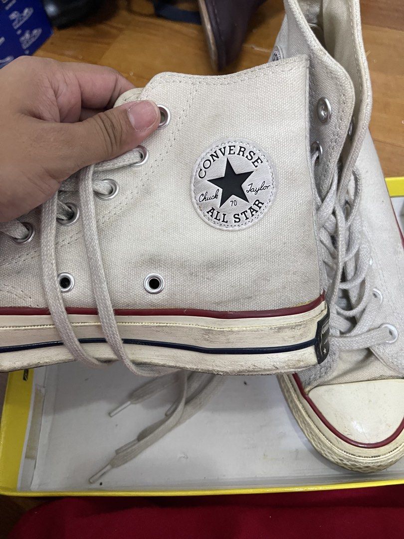 Converse Chuck 70 High Top Parchment (Category: Sneakers) located in Taguig. Submitted by 1307maloc (Listing ID 1467213639, Image 2). Description: - Item: Converse Chuck 70 High Top - Color: Parchment Off-White - Features: Iconic ankle patch logo, silver metal eyelets, flat laces, and vulcanized rubber midsole with black piping - Condition: Regular signs of wear on upper canvas, laces, and toe cap - Inclusion: Original box included - Mode of Paym