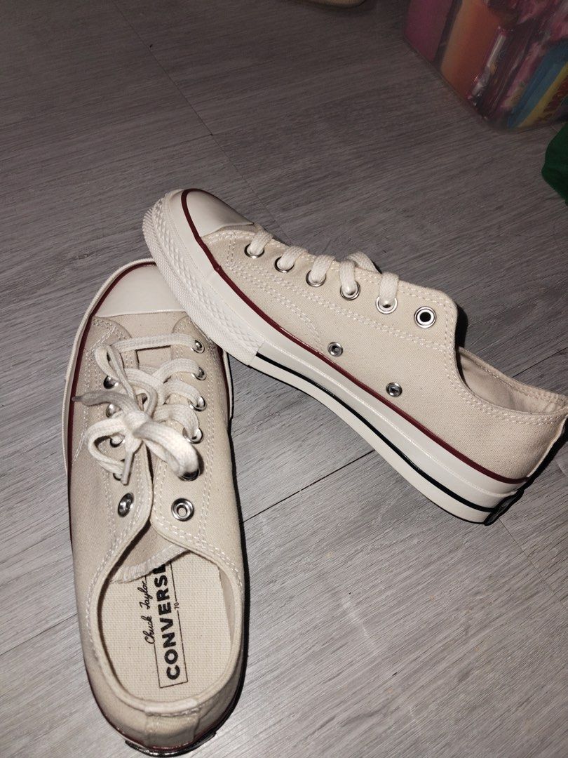 Converse Chuck 70 Men's Sneakers - Parchment (Category: Sneakers) located in Manila. Submitted by 67c00386dd5c4ce278b6ecea2edc17 (Listing ID 1467184477, Image 1). Description: Selling my Converse Chuck 70 Low - with box Details: 100% Authentic - from Converse Official Store Condition: 9/10 - Used once, slight stain but easy to clean Size: W8.5 / M6.5 / EU 40 / 25.5cm - Unisex Color: Off-white / Parchment Bought for ₱2,447 - Selling for ₱1,600 onl